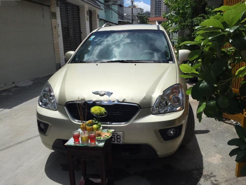 Kia Carens 2011 - Bán xe Kia Carens đời 2011, màu vàng