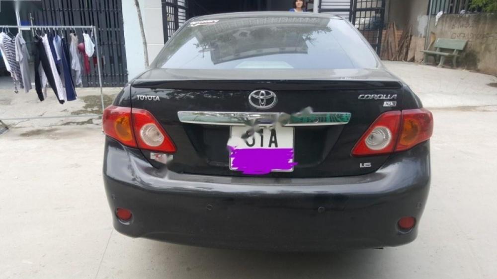 Toyota Corolla XLi 1.6 2009 - Cần bán xe Toyota Corolla XLi 1.6 năm sản xuất 2009, màu đen, xe nhập 