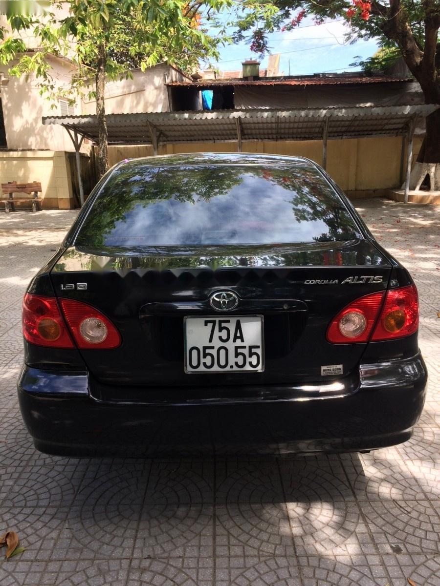 Toyota Corolla altis 2004 - Bán Toyota Corolla altis đời 2004, màu đen