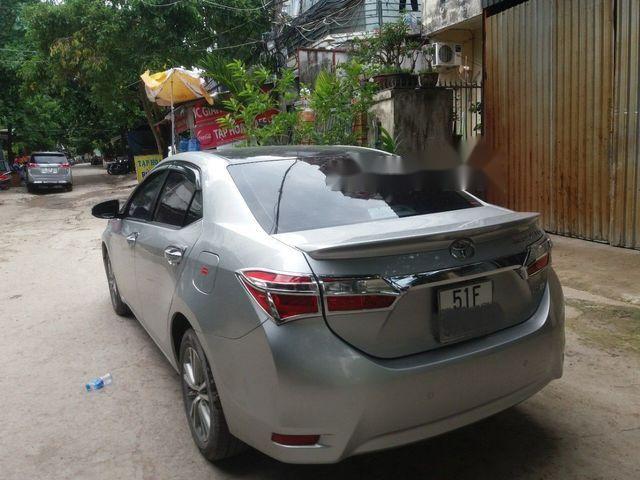 Toyota Corolla altis  1.8  2016 - Cần bán gấp Toyota Corolla altis 1.8 sản xuất 2016, màu bạc, giá chỉ 700 triệu