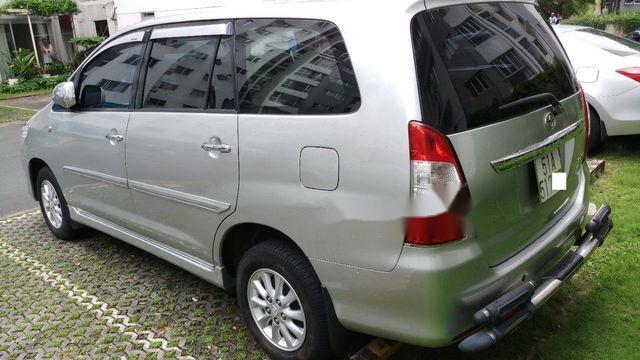 Toyota Innova E  2013 - Cần bán Toyota Innova E năm 2013, màu bạc chính chủ, giá tốt