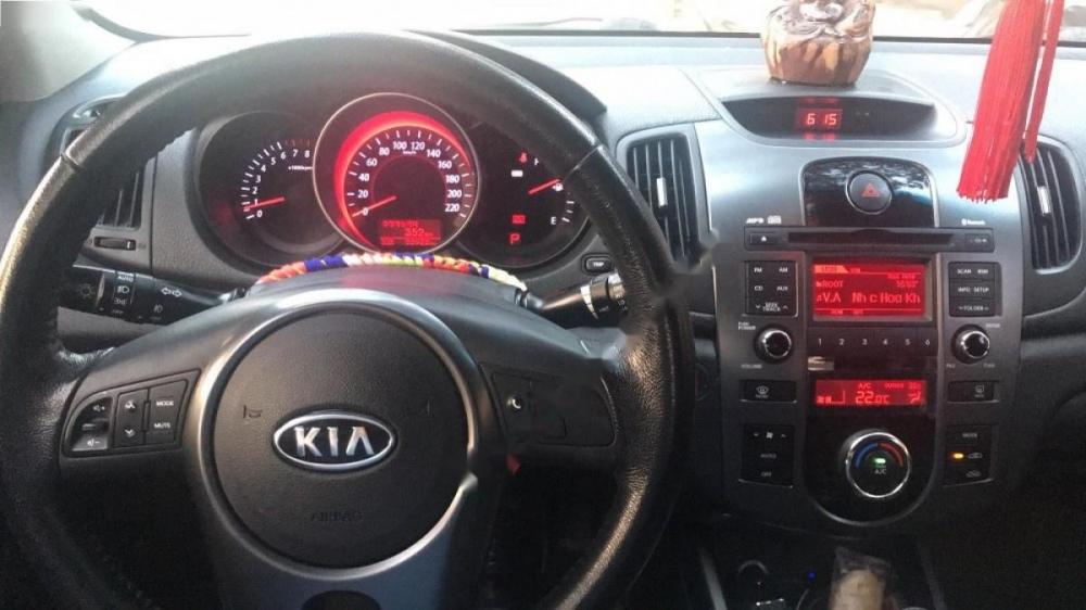 Kia Forte SLi 1.6 AT 2009 - Cần bán lại xe Kia Forte SLi 1.6 AT 2009, màu xám, nhập khẩu, 390 triệu