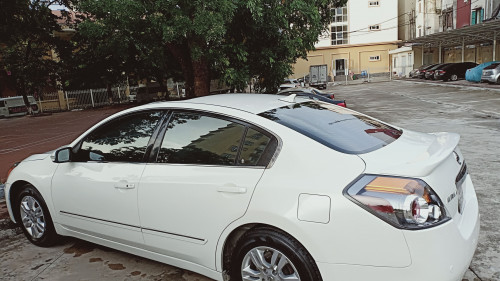 Nissan Altima   2.5S AT  2010 - Cần bán Nissan Altima 2.5S AT 2010, màu trắng như mới