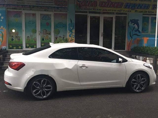 Kia Cerato Sport 2014 - Cần bán Kia Cerato Sport năm sản xuất 2014, màu kem (be)