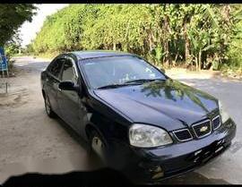 Chevrolet Lacetti 2004 - Bán Chevrolet Lacetti năm 2004, màu đen số sàn