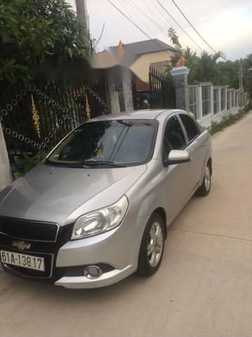 Chevrolet Aveo 2013 - Cần bán gấp Chevrolet Aveo 2013, màu bạc 