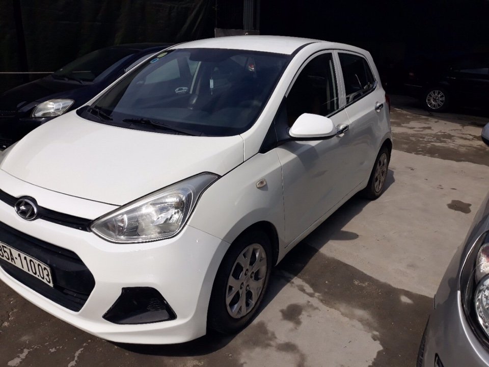 Hyundai Grand i10 2014 - Bán Hyundai i10 đời 2014, số sàn, màu trắng. Đẹp không lỗi