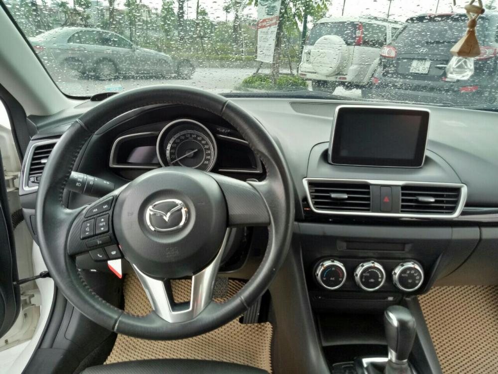 Mazda 3 1.5AT   2015 - Cần bán xe Mazda 3 1.5AT Hatchback năm sản xuất 2015, màu trắng, 625 triệu