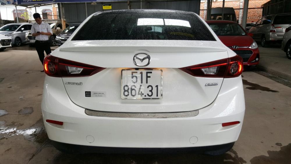 Mazda 3 Facelift 1.5AT 2017 - Bán Mazda 3 FaceLift 1.5AT màu trắng, số tự động, bản sedan sản xuất 2017, biển Sài Gòn, lăn bánh 40.000 km