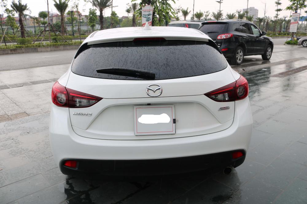Mazda 3 1.5AT   2015 - Cần bán xe Mazda 3 1.5AT Hatchback năm sản xuất 2015, màu trắng, 625 triệu