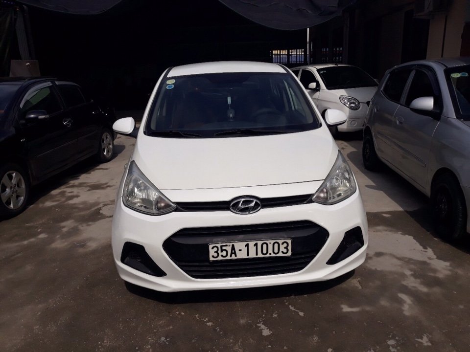 Hyundai Grand i10 2014 - Bán Hyundai i10 đời 2014, số sàn, màu trắng. Đẹp không lỗi