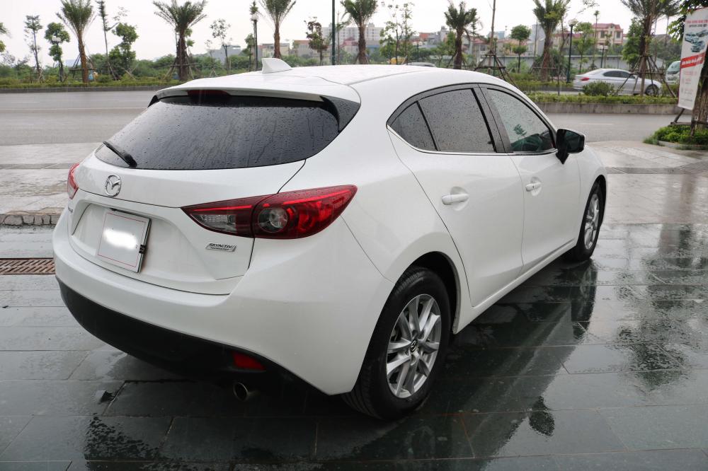 Mazda 3 1.5AT   2015 - Cần bán xe Mazda 3 1.5AT Hatchback năm sản xuất 2015, màu trắng, 625 triệu