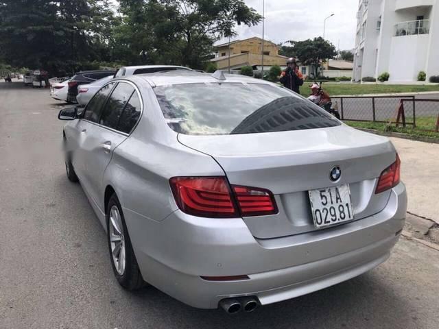 BMW 5 Series  523i  2010 - Bán BMW 523i sản xuất năm 2010, màu bạc, nhập khẩu