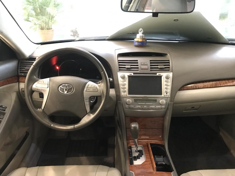 Toyota Camry 2.4G 2010 - Cần bán xe Toyota Camry sản xuất 2010 màu đen, giá tốt