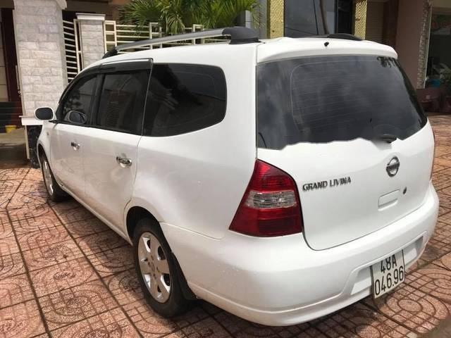 Nissan Livina   2010 - Bán xe Nissan Livina đời 2010, màu trắng, nhập khẩu nguyên chiếc chính chủ