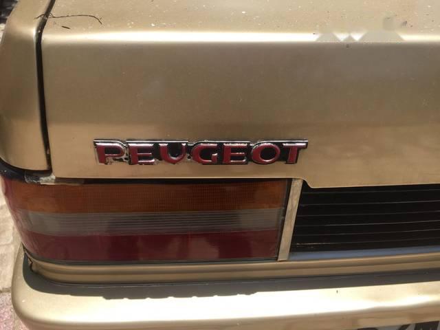 Peugeot 309 2006 - Cần bán Peugeot 309 năm 2006, màu vàng, nhập khẩu