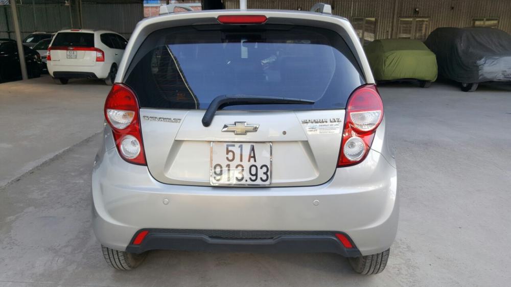 Chevrolet Spark 1.0 LTZ 2014 - Bán Chevrolet Spark LTZ 1.0AT màu bạc, số tự động sản xuất cuối 2014, biển Sài Gòn, 1 đời chủ chạy đúng 30.000km