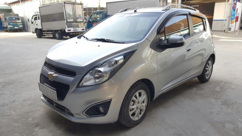 Chevrolet Spark 1.0 LTZ 2014 - Bán Chevrolet Spark LTZ 1.0AT màu bạc, số tự động sản xuất cuối 2014, biển Sài Gòn, 1 đời chủ chạy đúng 30.000km