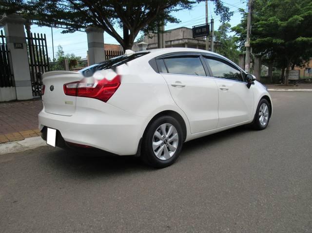 Kia Rio   1.4 AT   2015 - Bán ô tô Kia Rio 1.4 AT 2015, màu trắng số tự động, giá 452tr