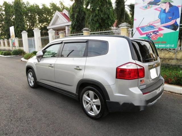 Chevrolet Orlando LTZ 2014 - Cần bán lại xe Chevrolet Orlando LTZ 2014, màu bạc số tự động 