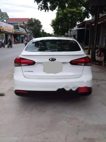 Kia Cerato 2016 - Cần bán gấp Kia Cerato năm 2016, màu trắng số sàn, 495 triệu