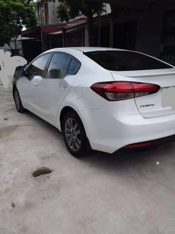 Kia Cerato 2016 - Cần bán gấp Kia Cerato năm 2016, màu trắng số sàn, 495 triệu