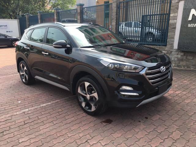 Hyundai Tucson 2018 - Bán Hyundai Tucson sản xuất năm 2018, màu đen, 902 triệu