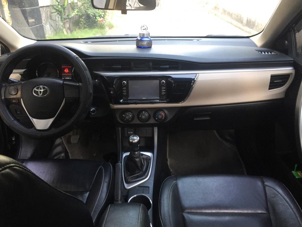 Toyota Corolla altis  G 2014 - Bán Toyota Corolla Altis G đời 2015 số sàn, màu đen