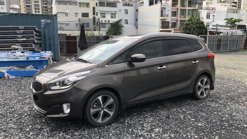 Kia Rondo   1.7L AT  2015 - Bán xe Kia Rondo 1.7L AT 2015, màu nâu