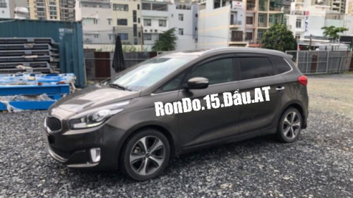 Kia Rondo   1.7L AT  2015 - Bán xe Kia Rondo 1.7L AT 2015, màu nâu