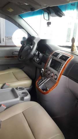 Kia Carnival 2009 - Bán ô tô Kia Carnival đời 2009, màu đen, giá 259tr