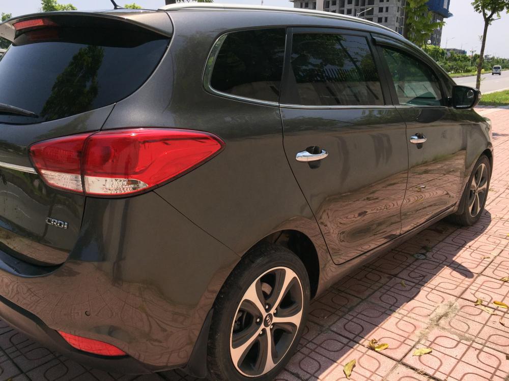 Kia Rondo 2015 - Bán Kia Rondo 1.7L máy dầu ECO rất tiết kiệm, số tự động, màu nâu coffe, Sx cuối 2015