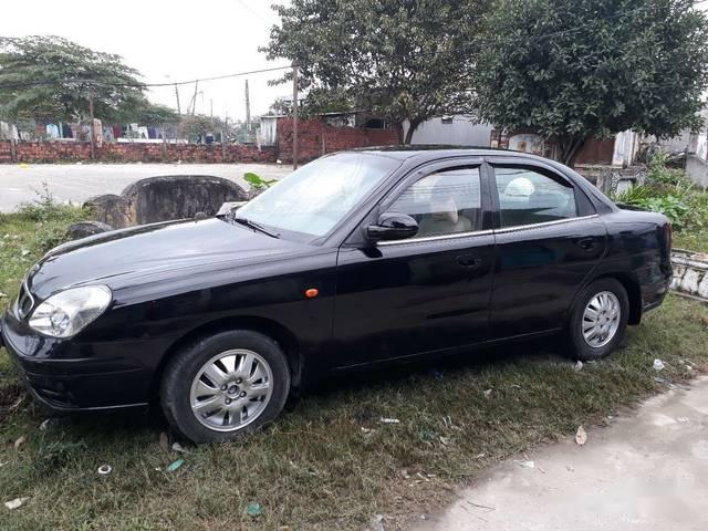 Daewoo Nubira 2002 - Bán Daewoo Nubira đời 2002, màu đen còn mới, giá 95tr