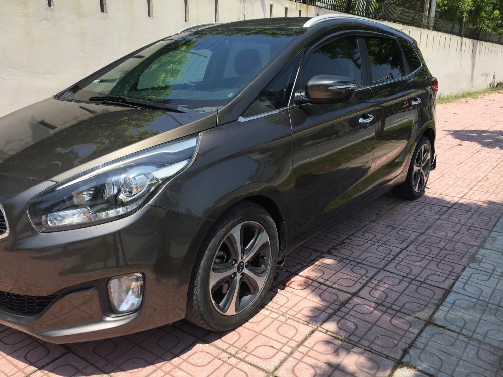 Kia Rondo 2015 - Bán Kia Rondo 1.7L máy dầu ECO rất tiết kiệm, số tự động, màu nâu coffe, Sx cuối 2015