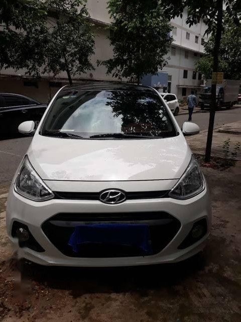 Hyundai Grand i10   2015 - Cần bán Hyundai Grand i10 đời 2015, màu trắng, nhập khẩu nguyên chiếc