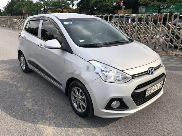 Hyundai Grand i10   1.25MT 2015 - Cần bán xe Hyundai Grand i10 1.25MT sản xuất 2015, màu trắng, nhập khẩu nguyên chiếc số sàn, giá tốt