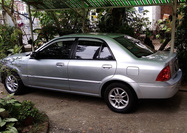 Ford Laser LXi 2004 - Cần bán Ford Laser LXi đời 2005, màu bạc, xe nhập, 220 triệu