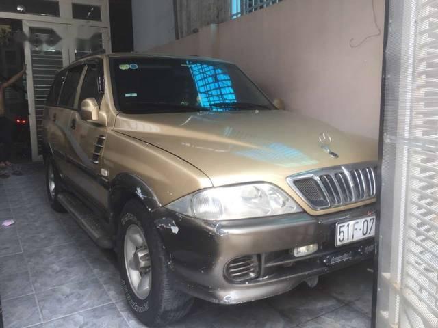 Ssangyong Musso   2003 - Cần bán xe Ssangyong Musso đời 2003, màu vàng, nhập khẩu nguyên chiếc xe gia đình, 200tr