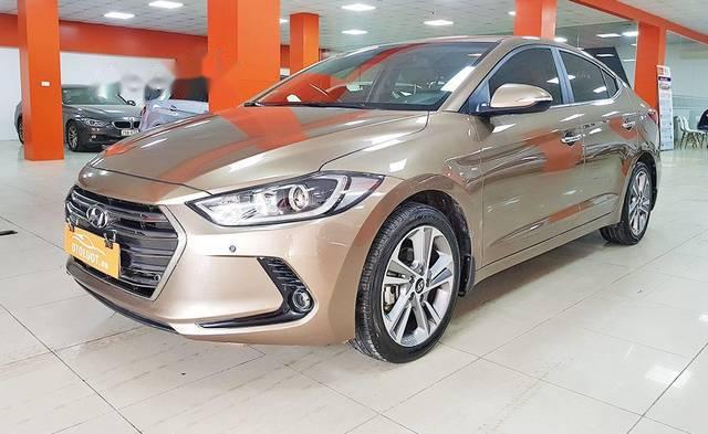 Hyundai Elantra  2.0  2016 - Cần bán Hyundai Elantra 2.0 sản xuất năm 2016, màu vàng