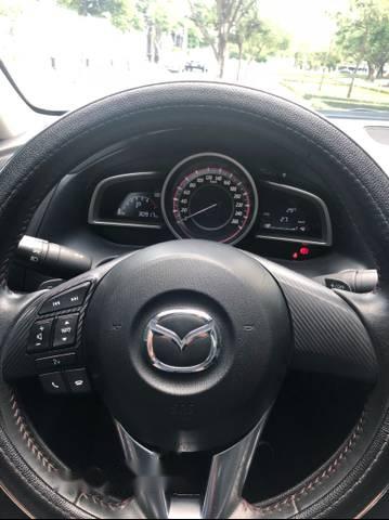 Mazda 3  1.5AT 2015 - Cần bán xe Mazda 3 1.5AT sản xuất năm 2015, màu trắng, giá chỉ 595 triệu