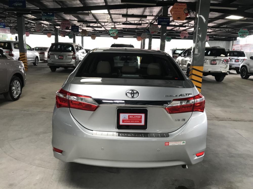 Toyota Corolla altis 1.8G MT 2015 - Cần bán xe Toyota Corolla altis 1.8G MT đời 2015, màu bạc