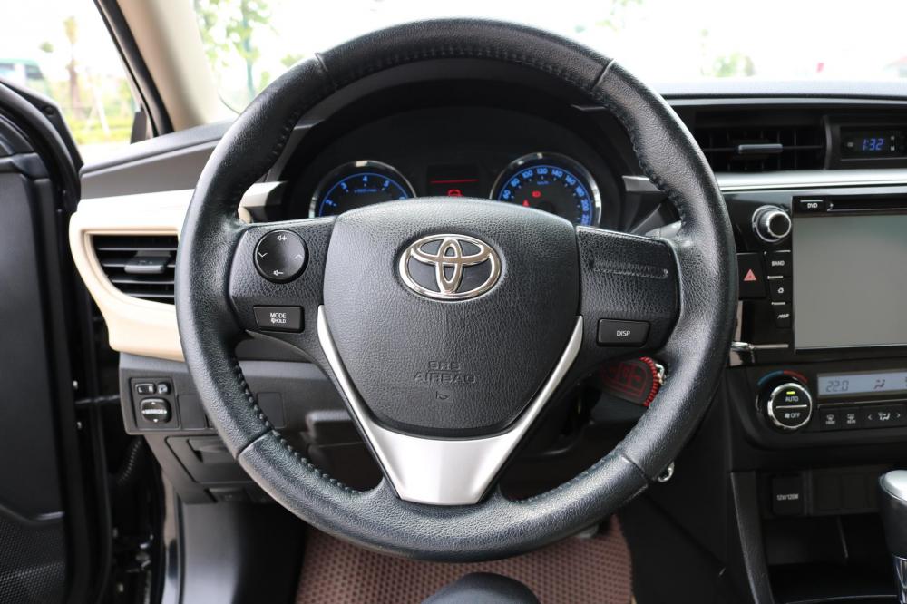 Toyota Corolla altis 1.8 G 2015 - Bán Toyota Corolla altis 1.8 G sản xuất 2015, màu đen