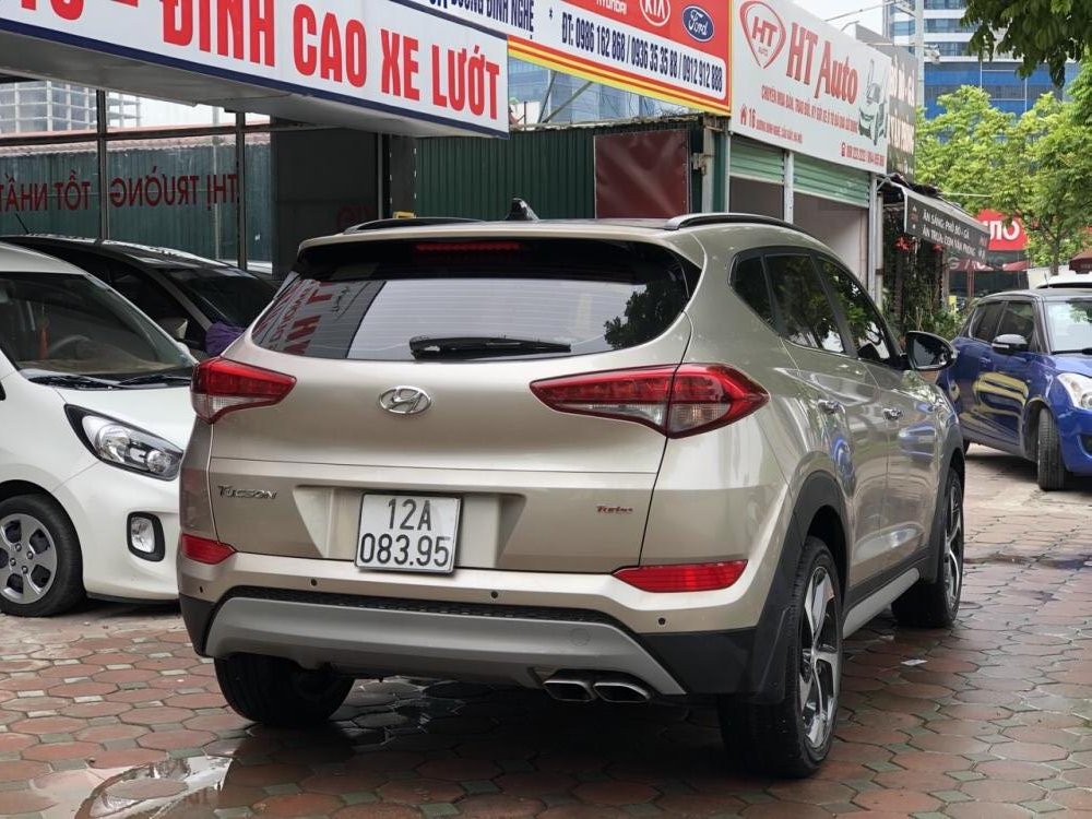 Hyundai Tucson 1.6 Tubor 2017 - Cần bán Hyundai Tucson 1.6 Tubor năm 2017, màu vàng