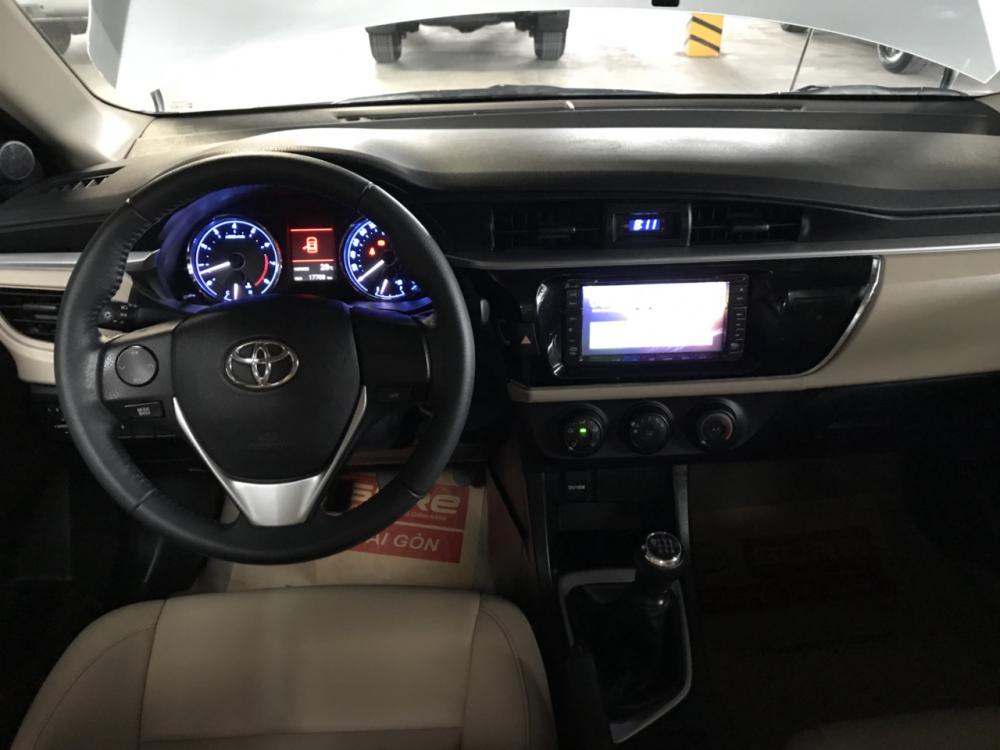 Toyota Corolla altis 1.8G MT 2015 - Cần bán xe Toyota Corolla altis 1.8G MT đời 2015, màu bạc