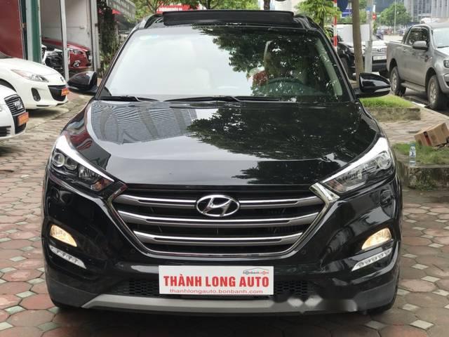 Hyundai Tucson 1.6 Turbo  2016 - Bán Hyundai Tucson 1.6 Turbo năm 2016, màu đen, giá 940tr