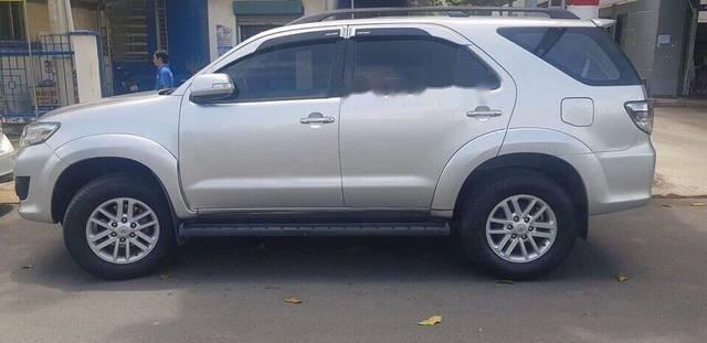 Toyota Fortuner 2013 - Bán Toyota Fortuner đời 2013, màu bạc còn mới, giá chỉ 660 triệu