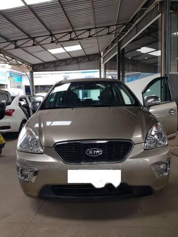 Kia Carens S 2.0MT 2015 - Cần bán lại xe Kia Carens S 2.0MT đời 2015, màu vàng số sàn, giá 456tr