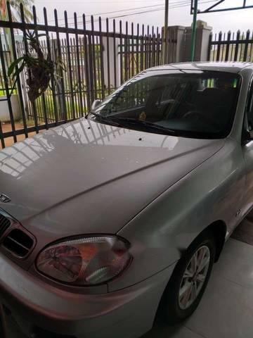 Daewoo Lanos 2004 - Cần bán lại xe Daewoo Lanos sản xuất năm 2004, màu bạc giá cạnh tranh