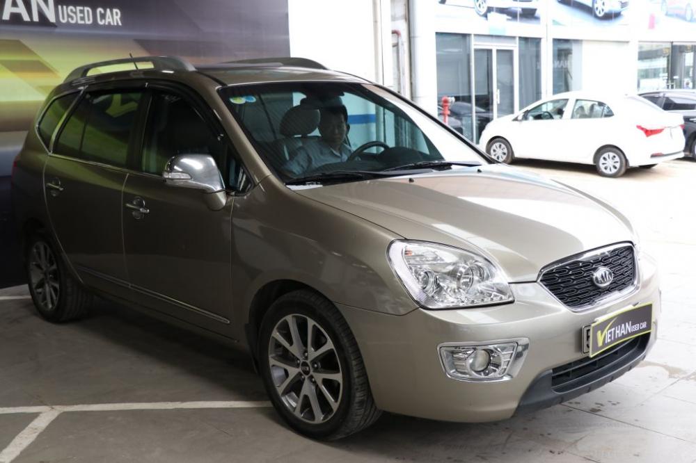 Kia Carens S SX 2.0MT 2015 - Bán ô tô Kia Carens S SX 2.0MT sản xuất năm 2018, màu vàng