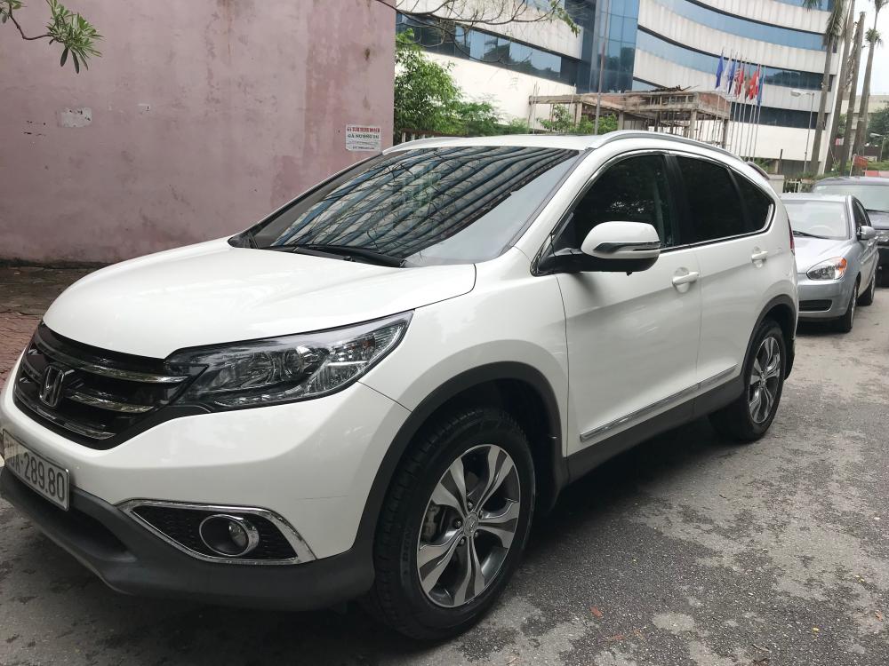 Honda CR V 2.4 at 2014 - Em bán xe Honda CR-V 2.4 AT sx 2014 màu trắng tư nhân chính chủ, xe sơn zin 95%, lốp 5 quả theo xe